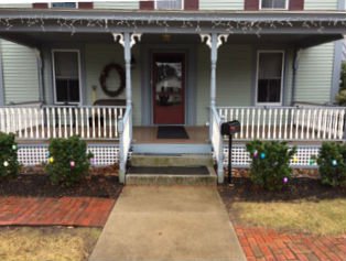 Tom Keeps the Entryway Clear of Snow at His B & B