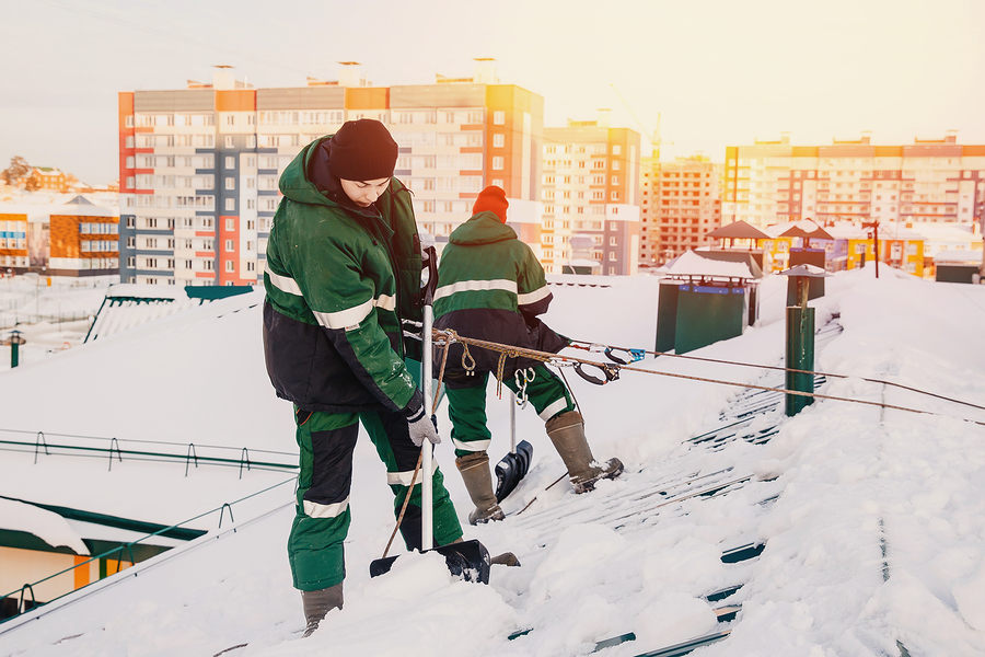 Staying Safe When Removing Snow and Ice from Your Facility's Roof