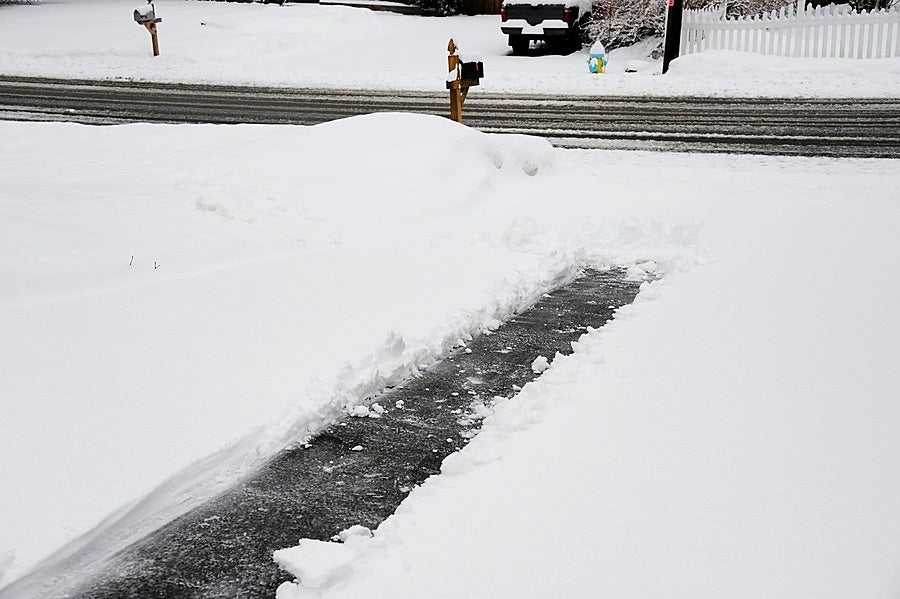 Heated Driveway Systems vs. Portable Heating Mats - This Old House