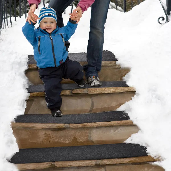 Snow and ice melting stair tread mats for homes