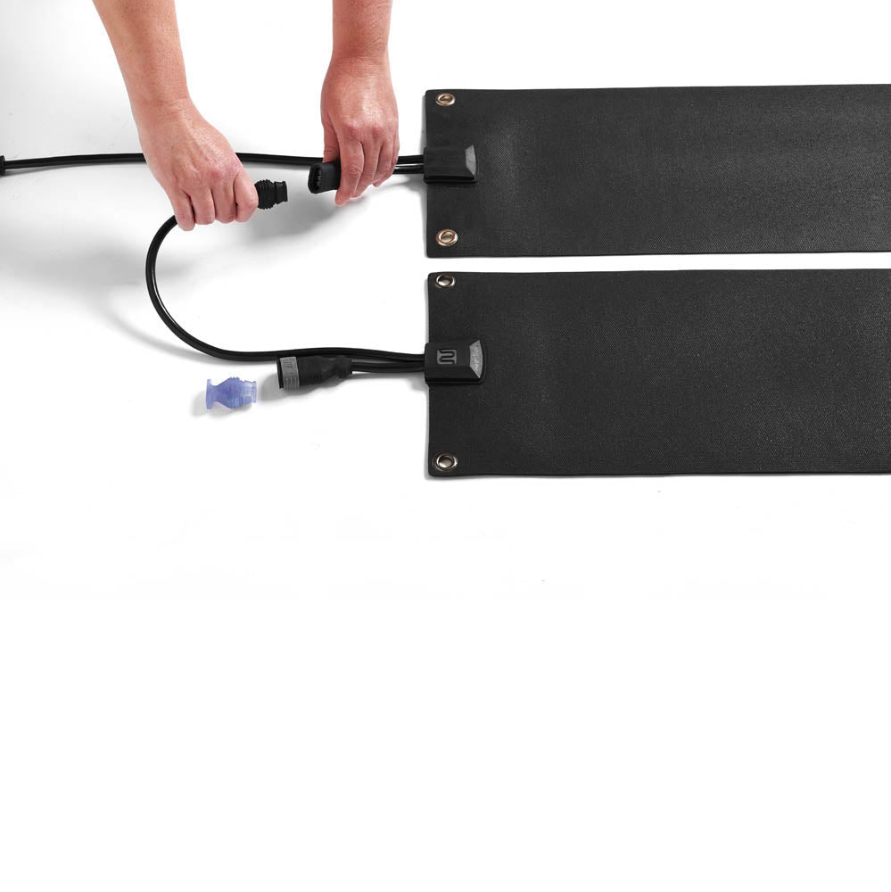 Connecting the mats is easy. Simply align the prong and socket sequence to ensure a watertight connection. Once connected, slip the gray locking sleeve in place for additional compression on the watertight seal. And just like that, you've created your own snow & ice melting system for stairs. hover