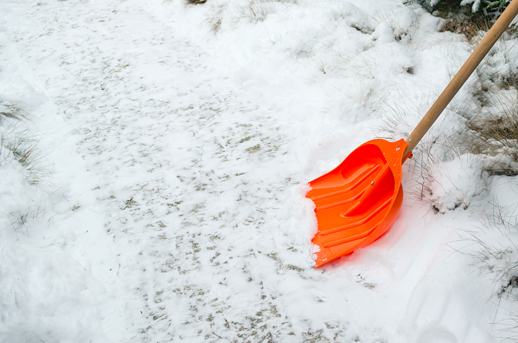 Snow shovel scraping the ground