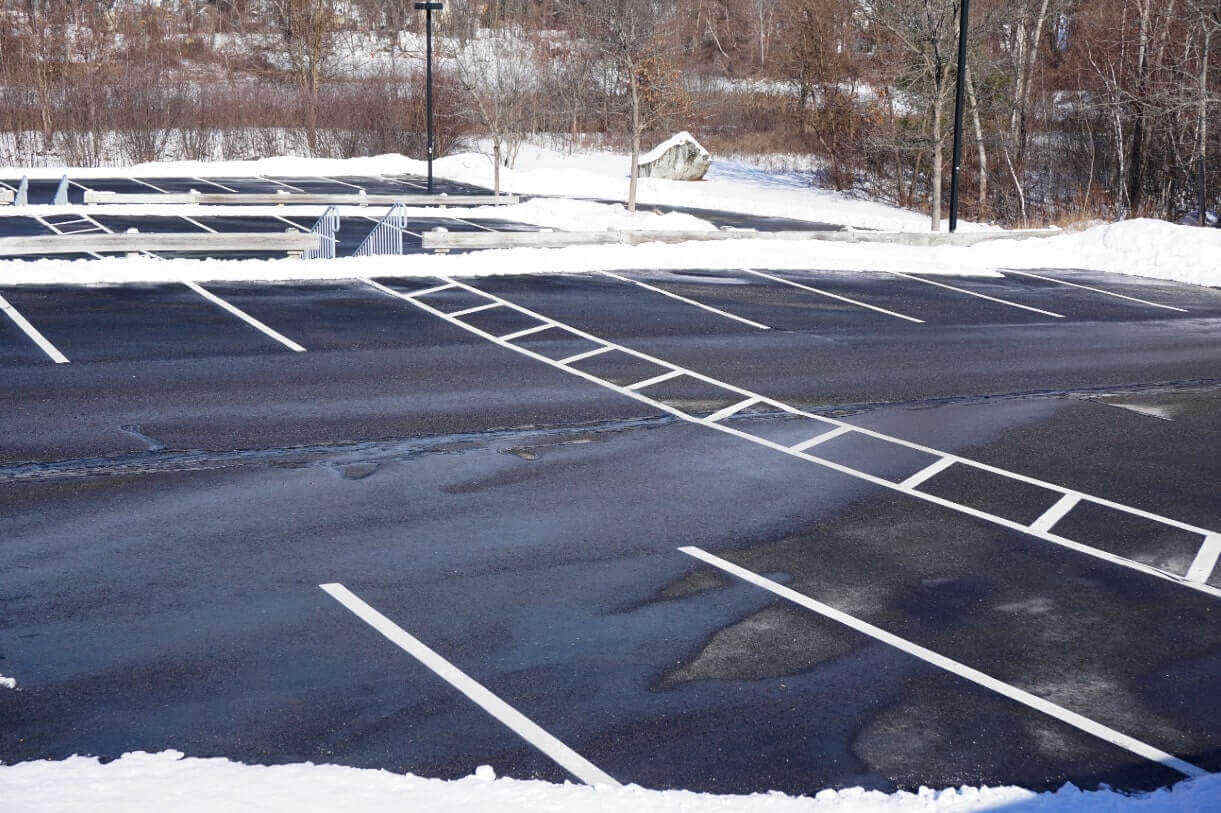 Commercial Snow Removal 101: How and Why to Pretreat Your Parking Lots