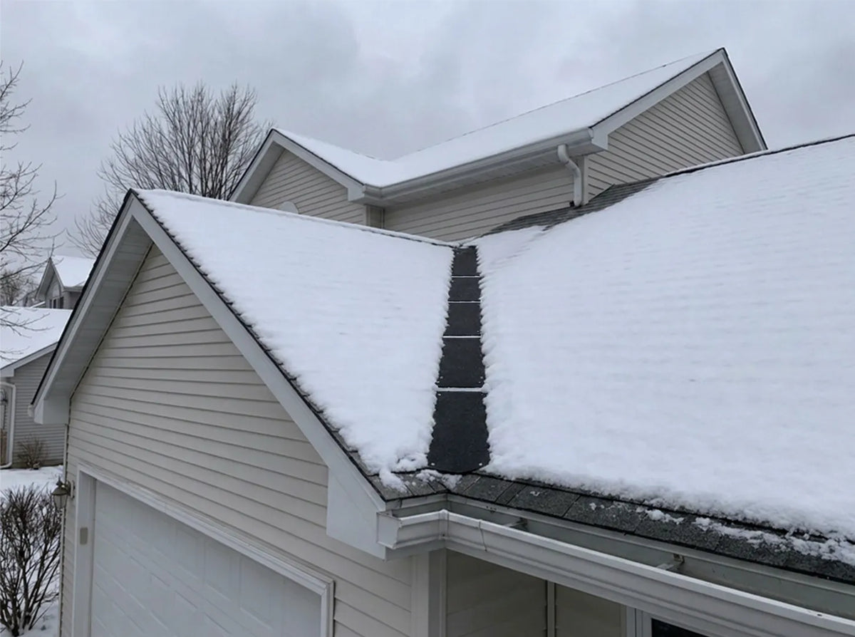 HeatTrak Walkway mats being used on a roof to prevent snow buildup